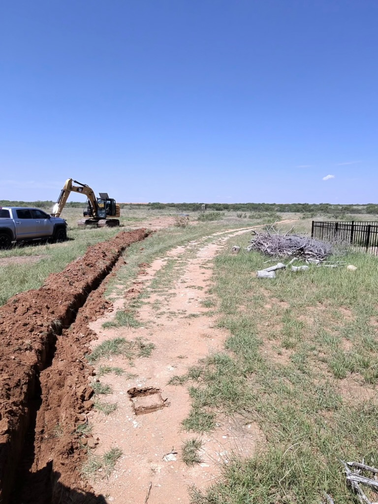 Trench with an excavator